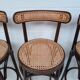 4 curved wood and cane bar stools