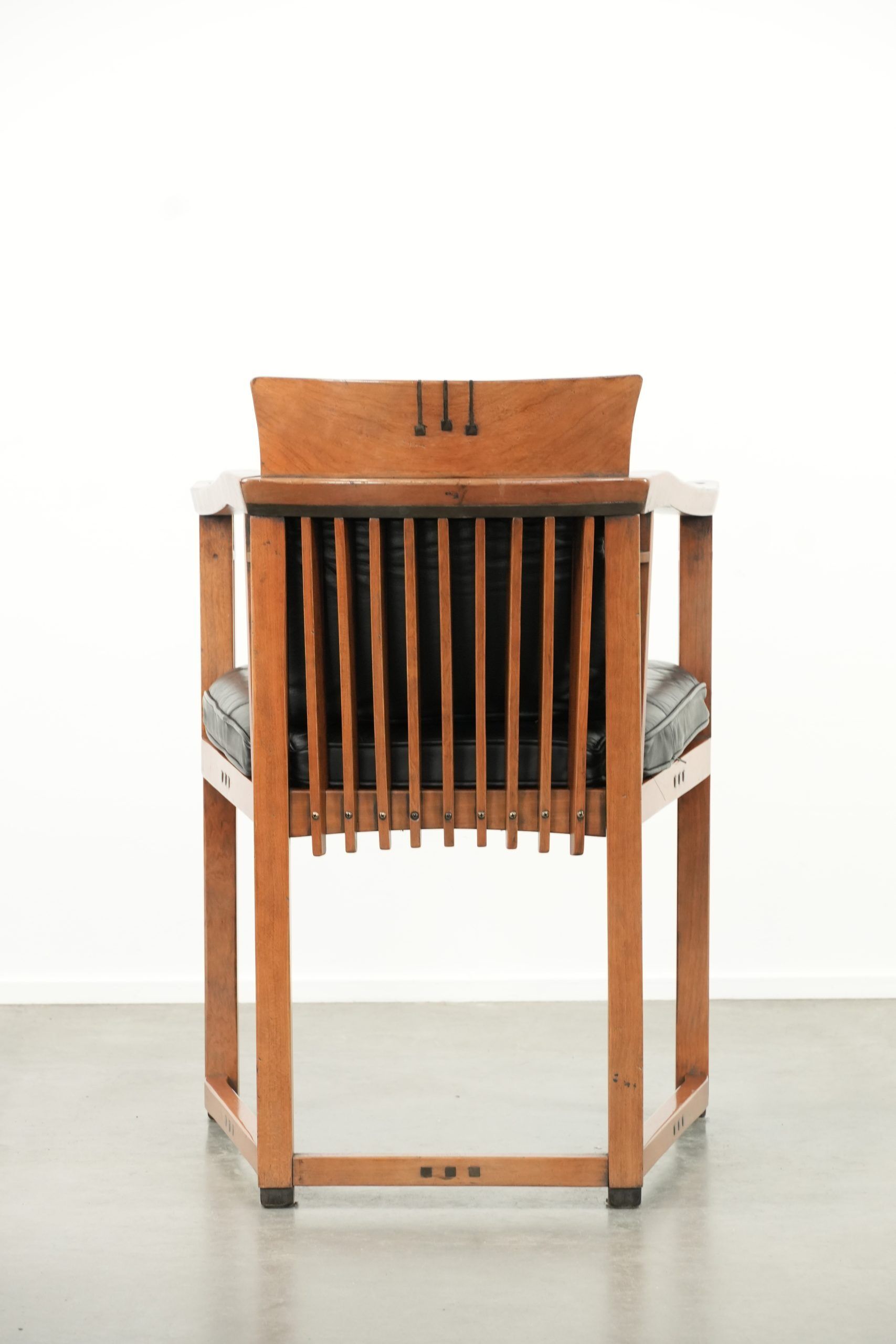 Black leather Art Deco design dining/side/desk chair with armrests