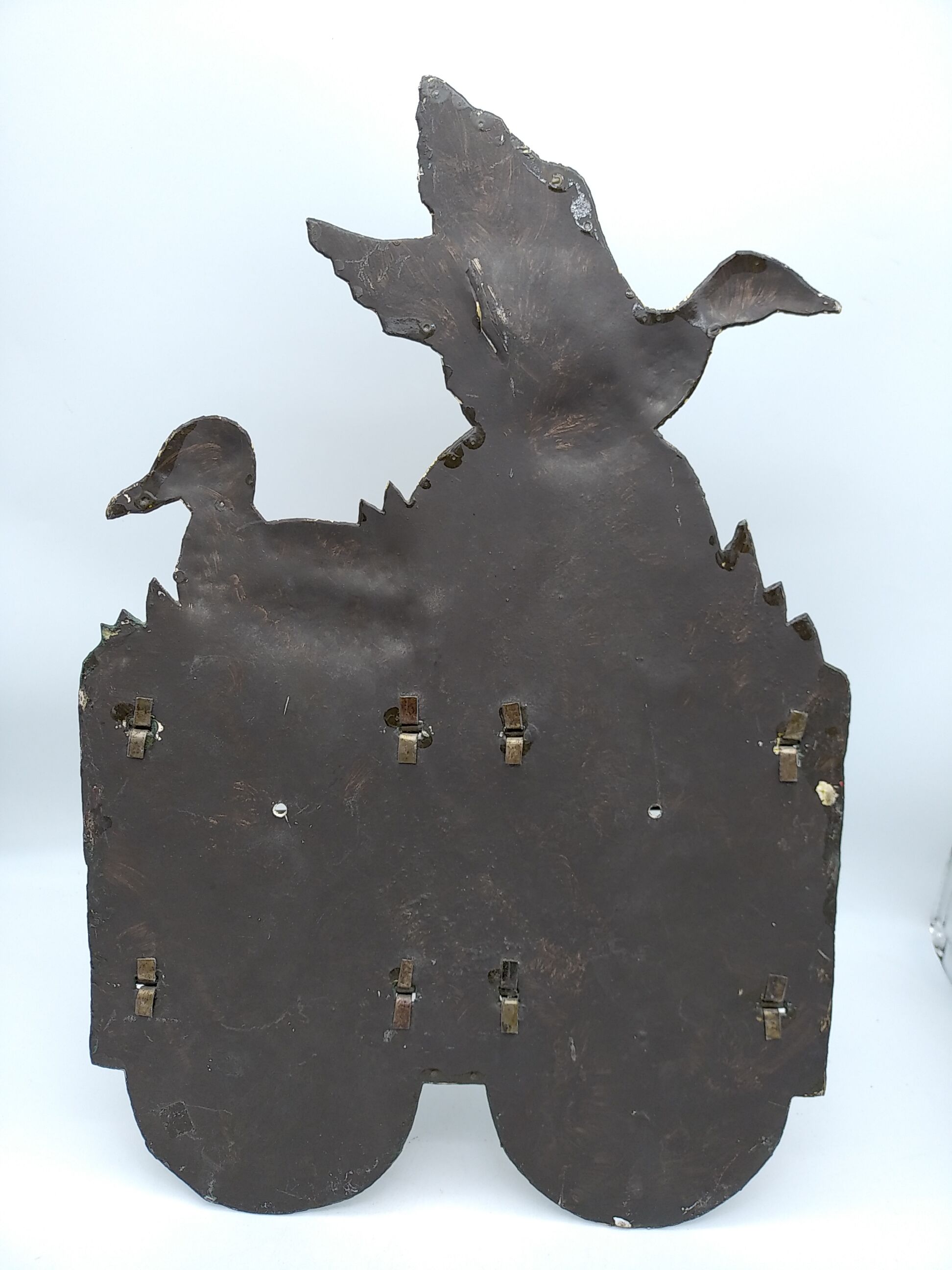 Metal wall tie door with duck decoration. 50s .