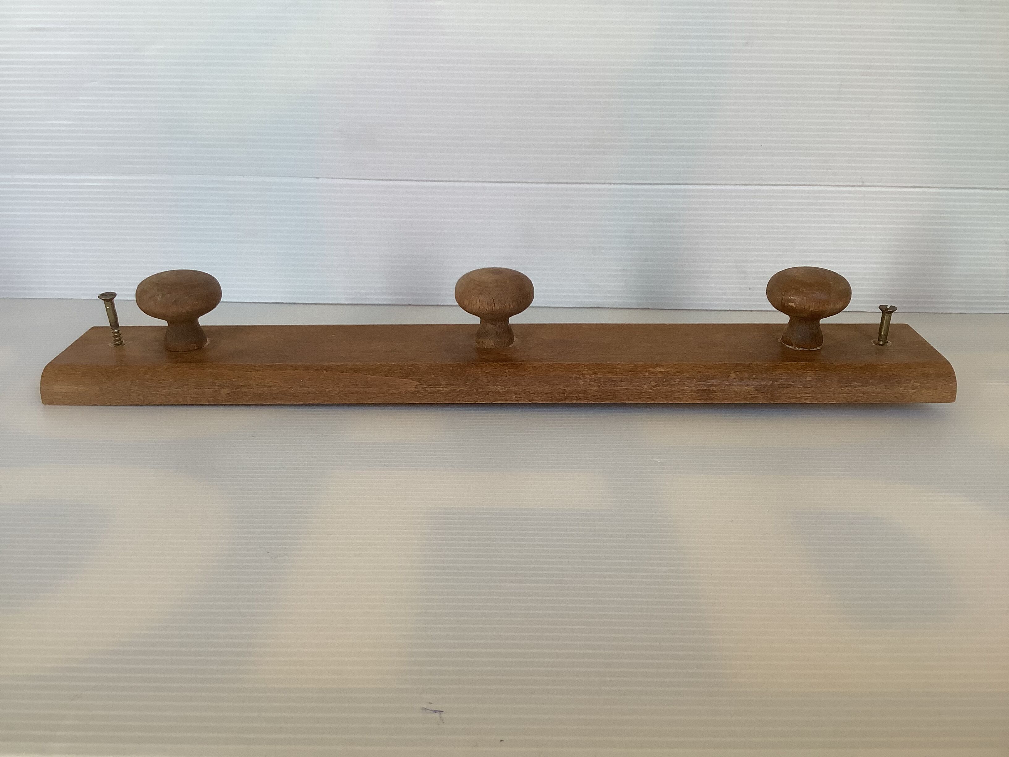 Wooden wall coat rack