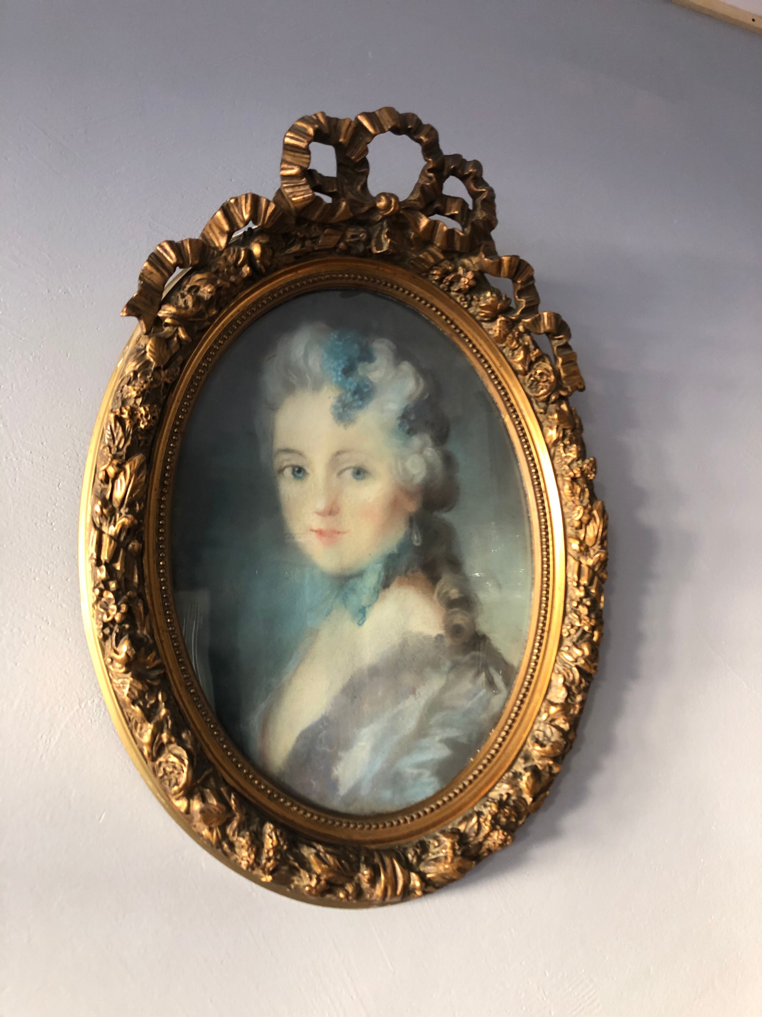 Pastel portrait, medallion frame
