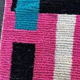 Moroccan Berber rug corridor in pink and blue wool.