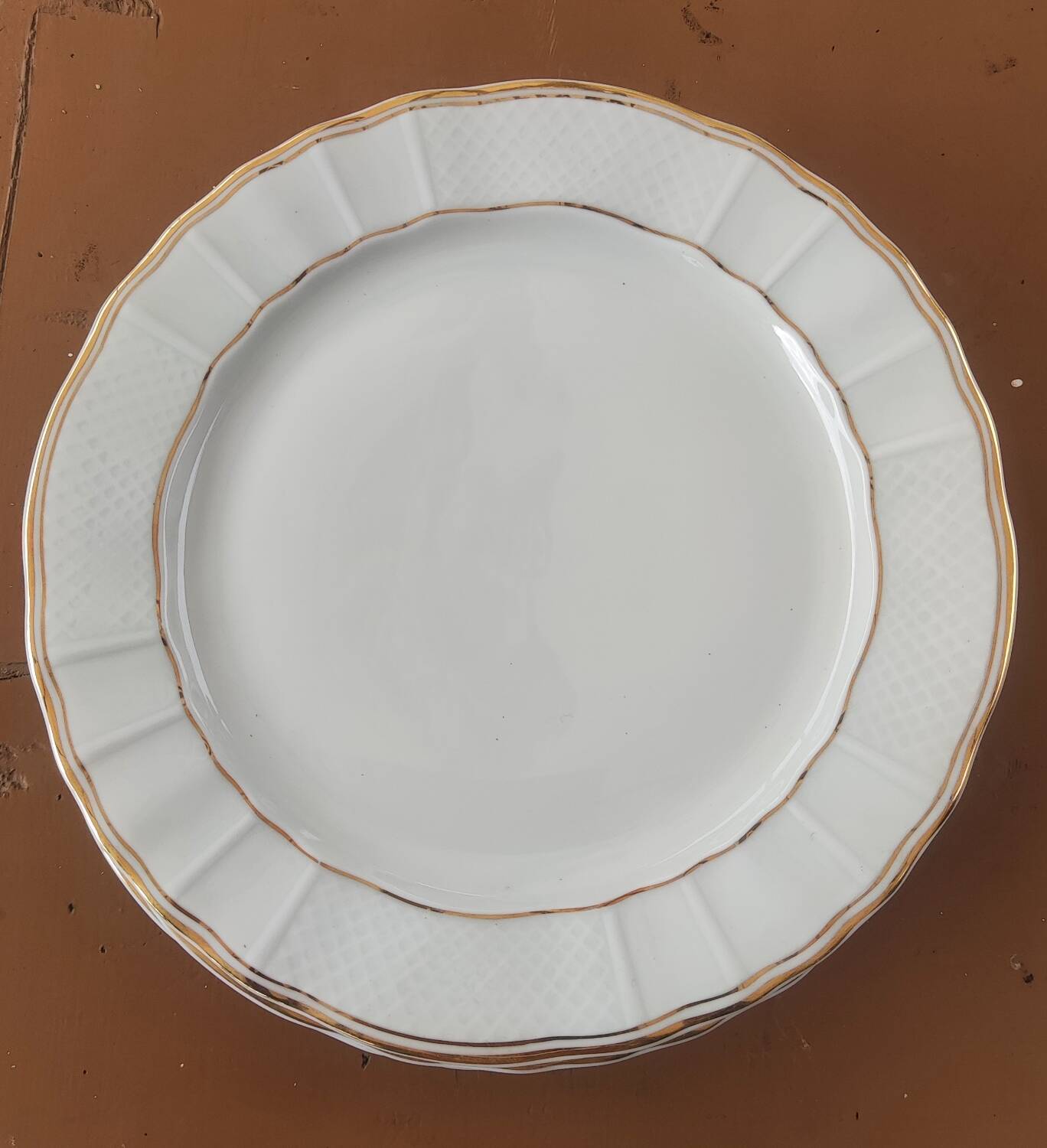 Ten Limoges porcelain plates B et Cie