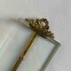 Brass frame and beveled glass