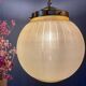 Vintage art deco globe pendant light in yellow and gold granite glass