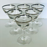 Set of 8 stemmed port glasses with silver trim.