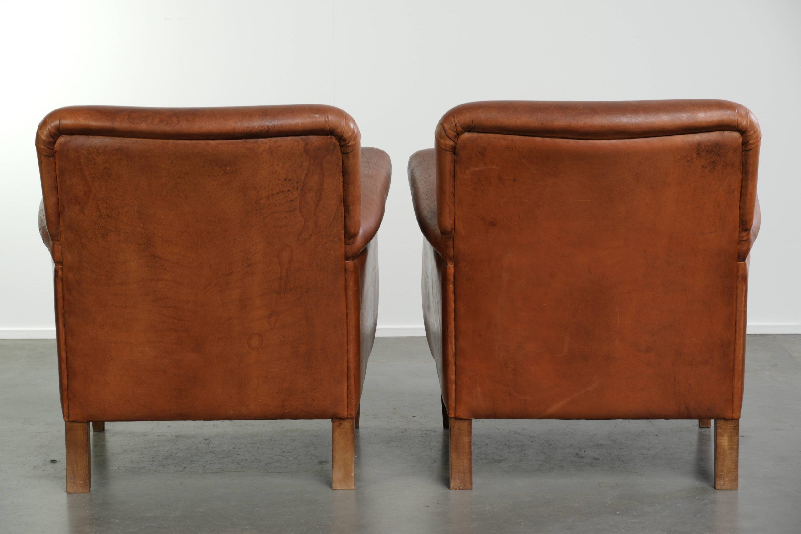 Comfortable set of sheepskin armchairs with and a timeless design