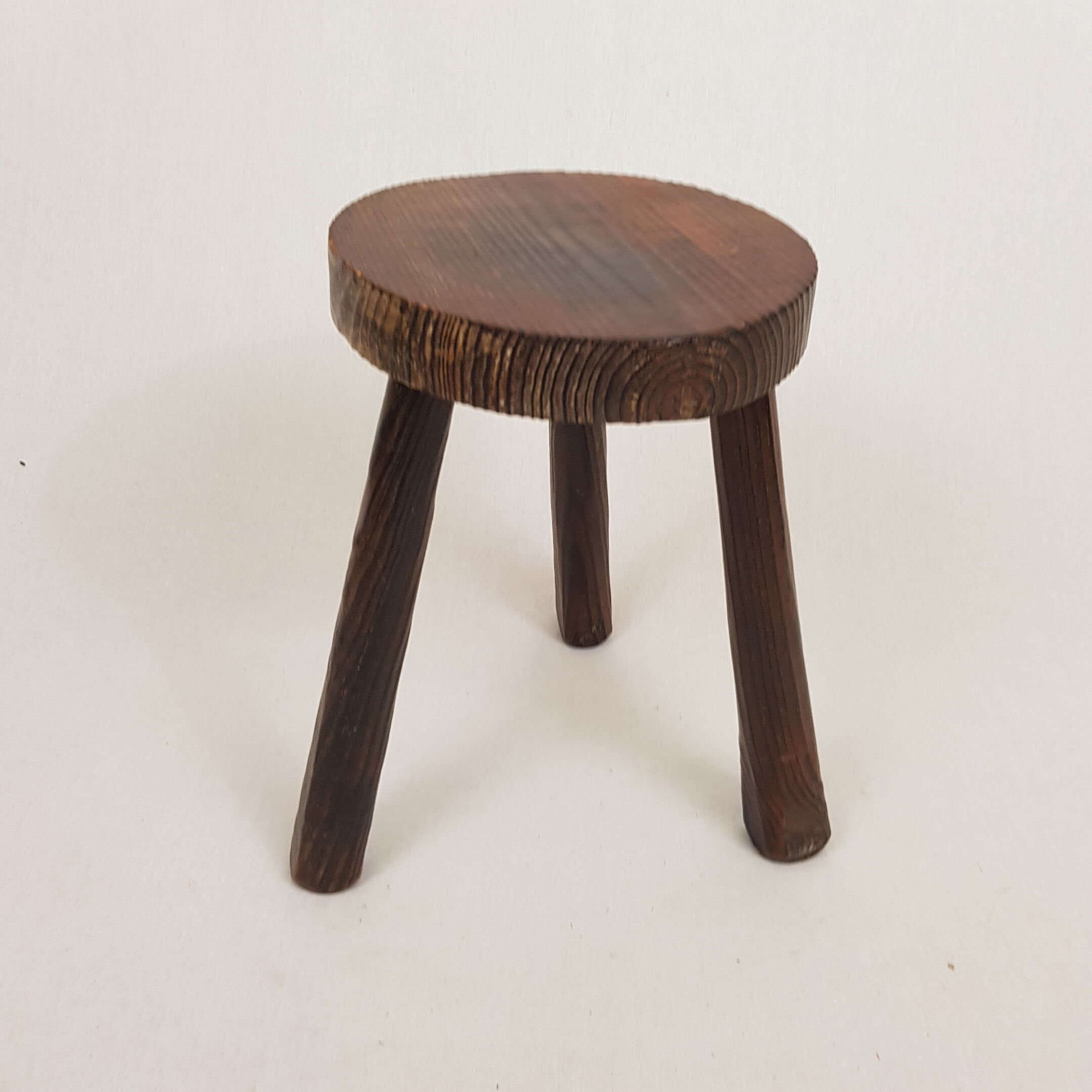 Wooden tripod stool