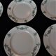 Série de six assiettes plates en faïence de Longchamp modèle Sapho
