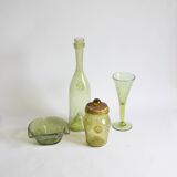 Biot bubble glass ensemble, bottle, jar, bowl and glass.