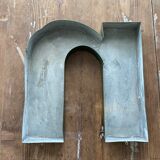 Letter n or u