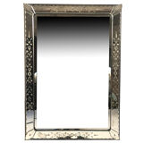 Mirror of Venice with decoration engraved with flowers