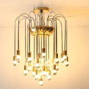 Tubular chrome and brass waterfall chandelier, Italy 1970s.