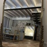 Large gilded mirror with pediment