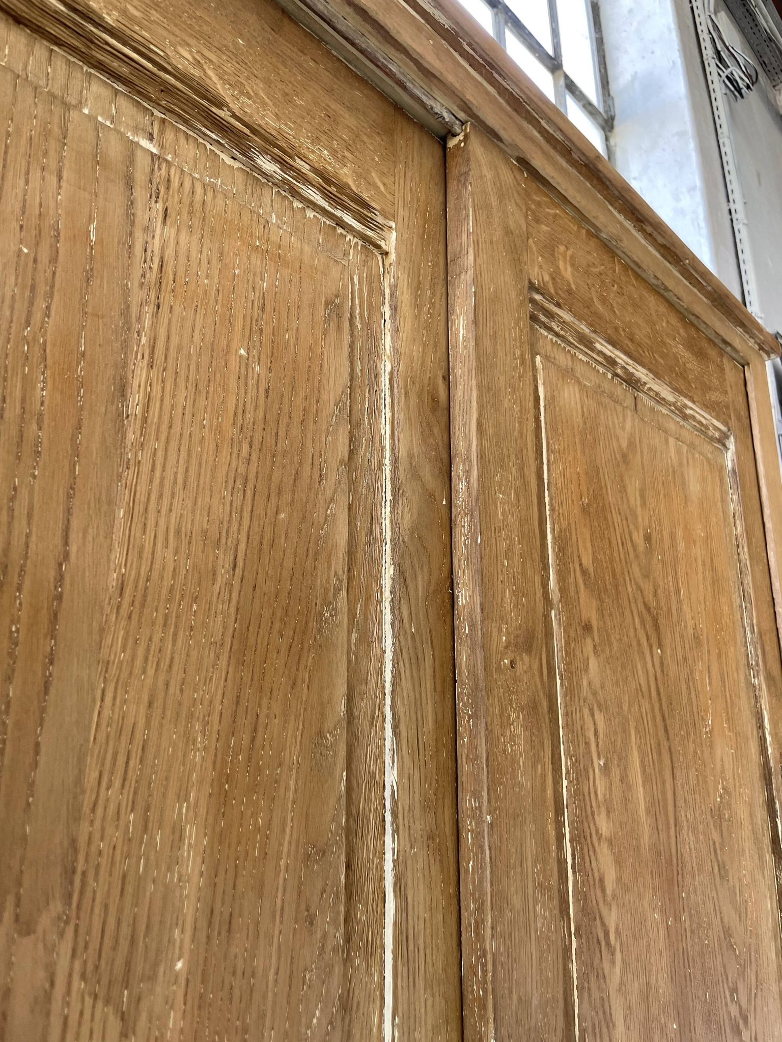 Large row of solid oak loom sliding doors