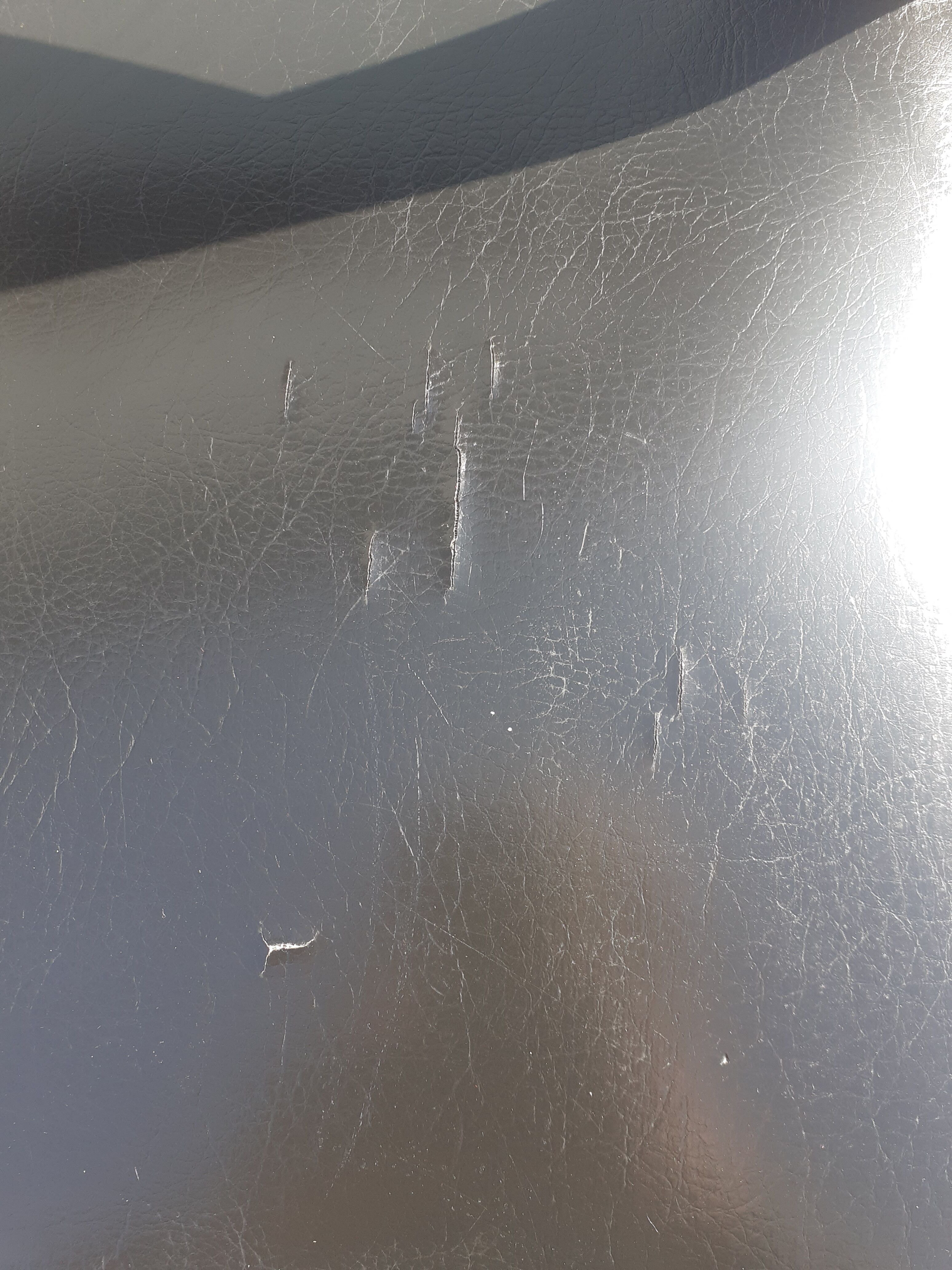 Scandinavian chairs in teak and black skaï.