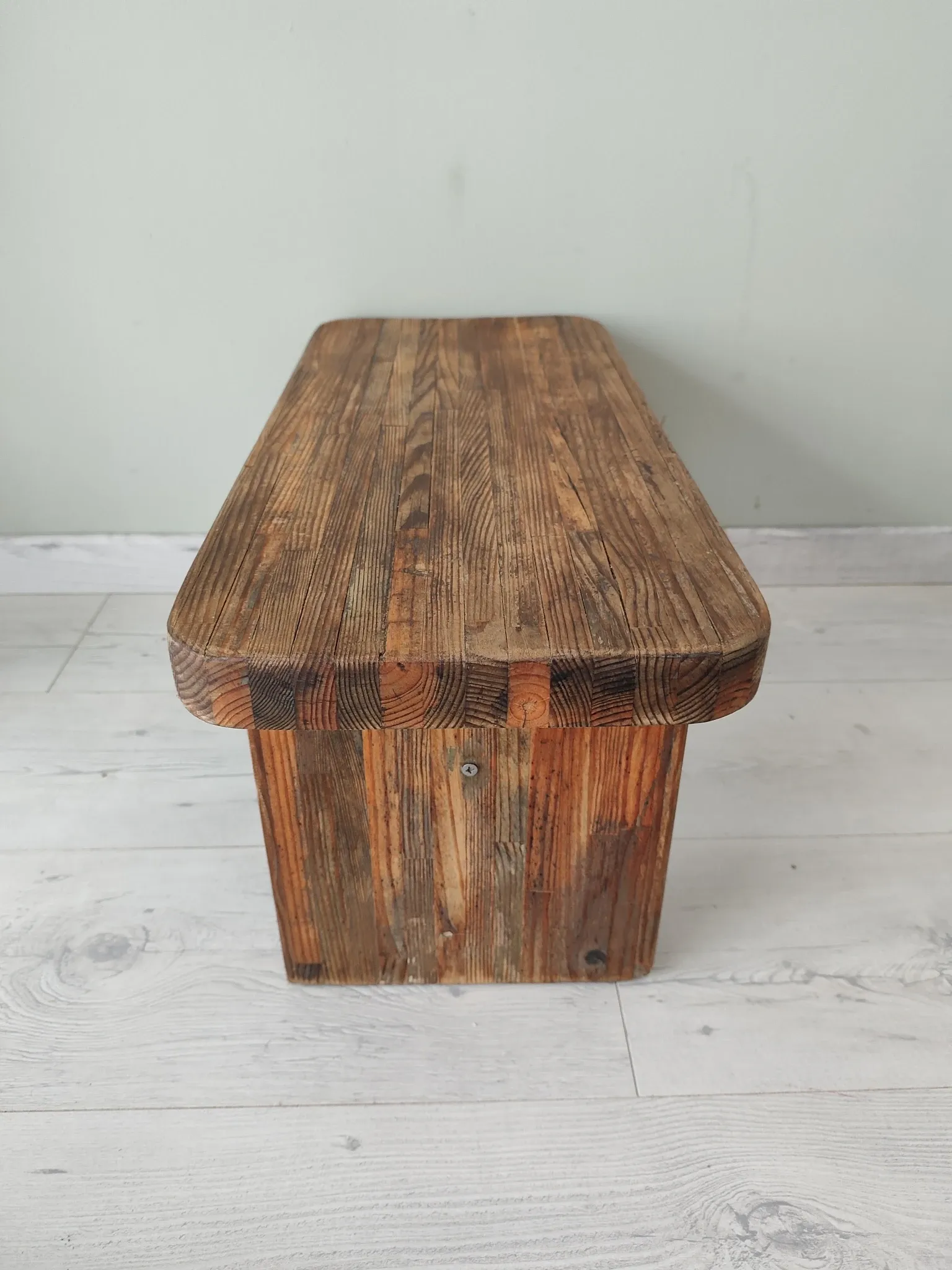 Small rustic wooden bench