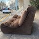 Two-seater velvet armchair with a vintage 70s pattern.
