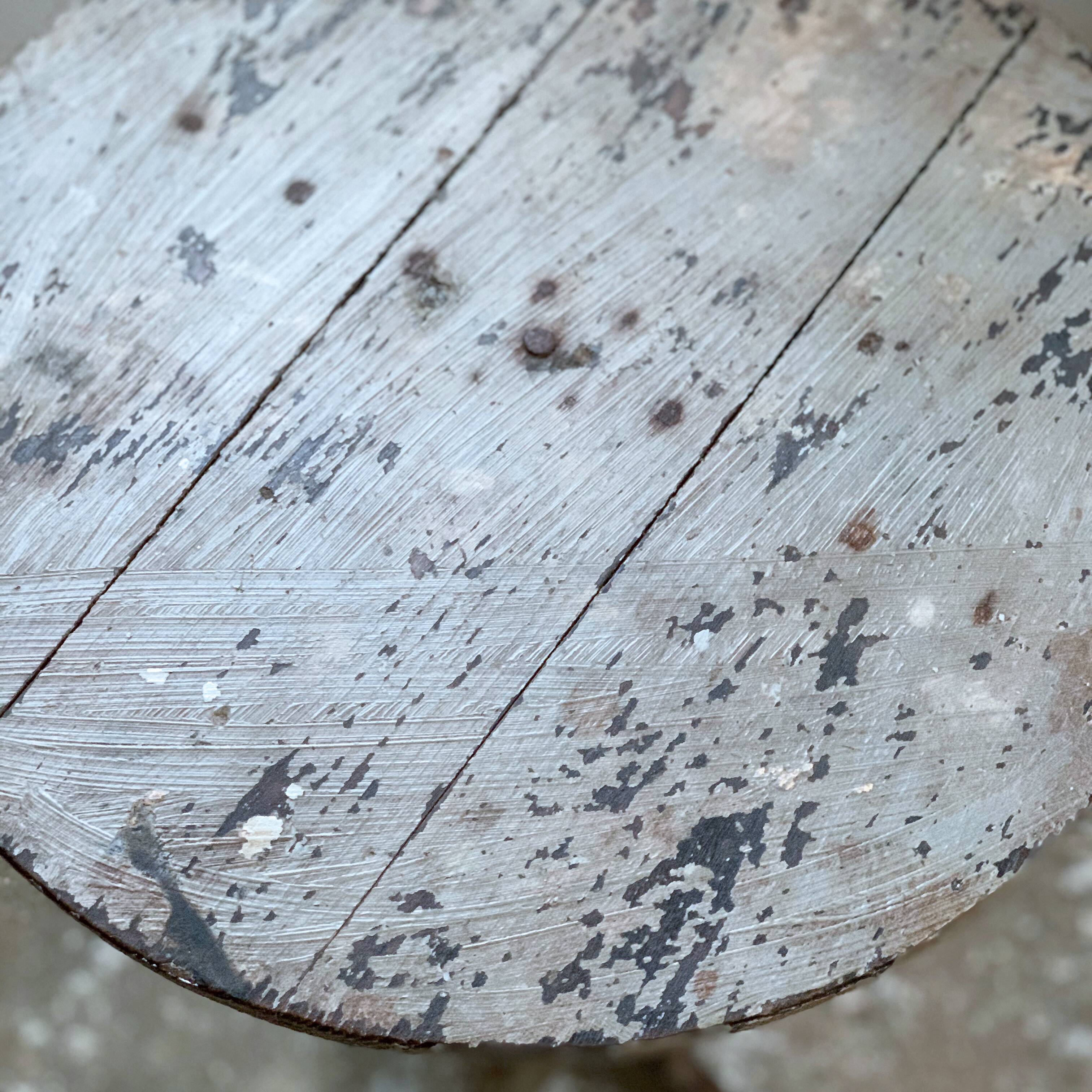 wooden pedestal or primitive winemaker's table