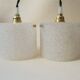 Pair of suspensions