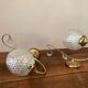 Duo of brass and glass wall lamps