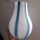 Beautiful white glass vase with blue stripes from the 80s.