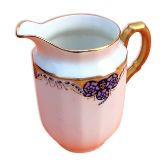 Hexadecagone milk pot 1930s white porcelain enhanced with a gold border and a frieze at