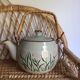 Vintage teapot wicker handle