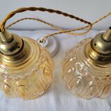 Duo of amber molded glass pendant lights