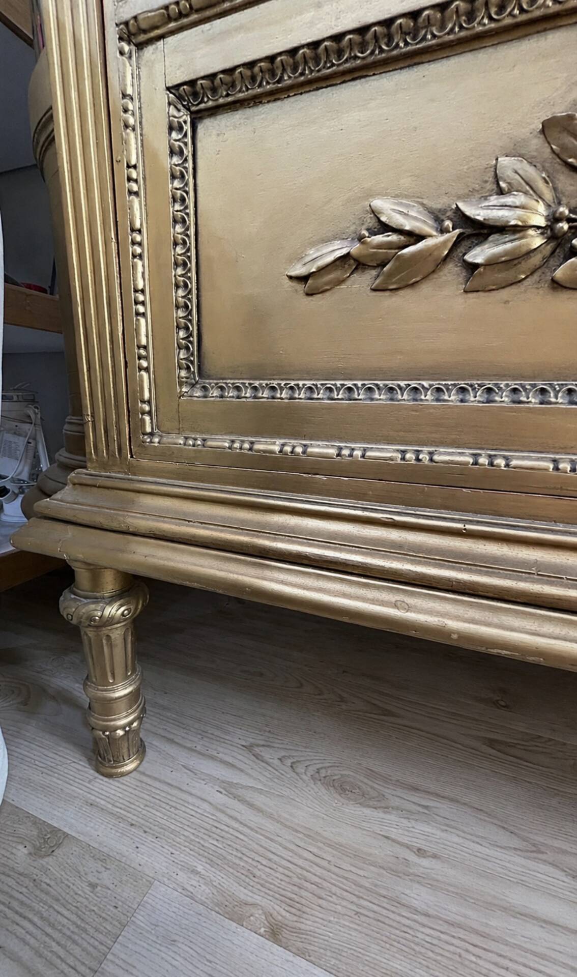 French antique Louis XVI display cabinet in gilded wood with curved glass sides.