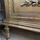 French antique Louis XVI display cabinet in gilded wood with curved glass sides.