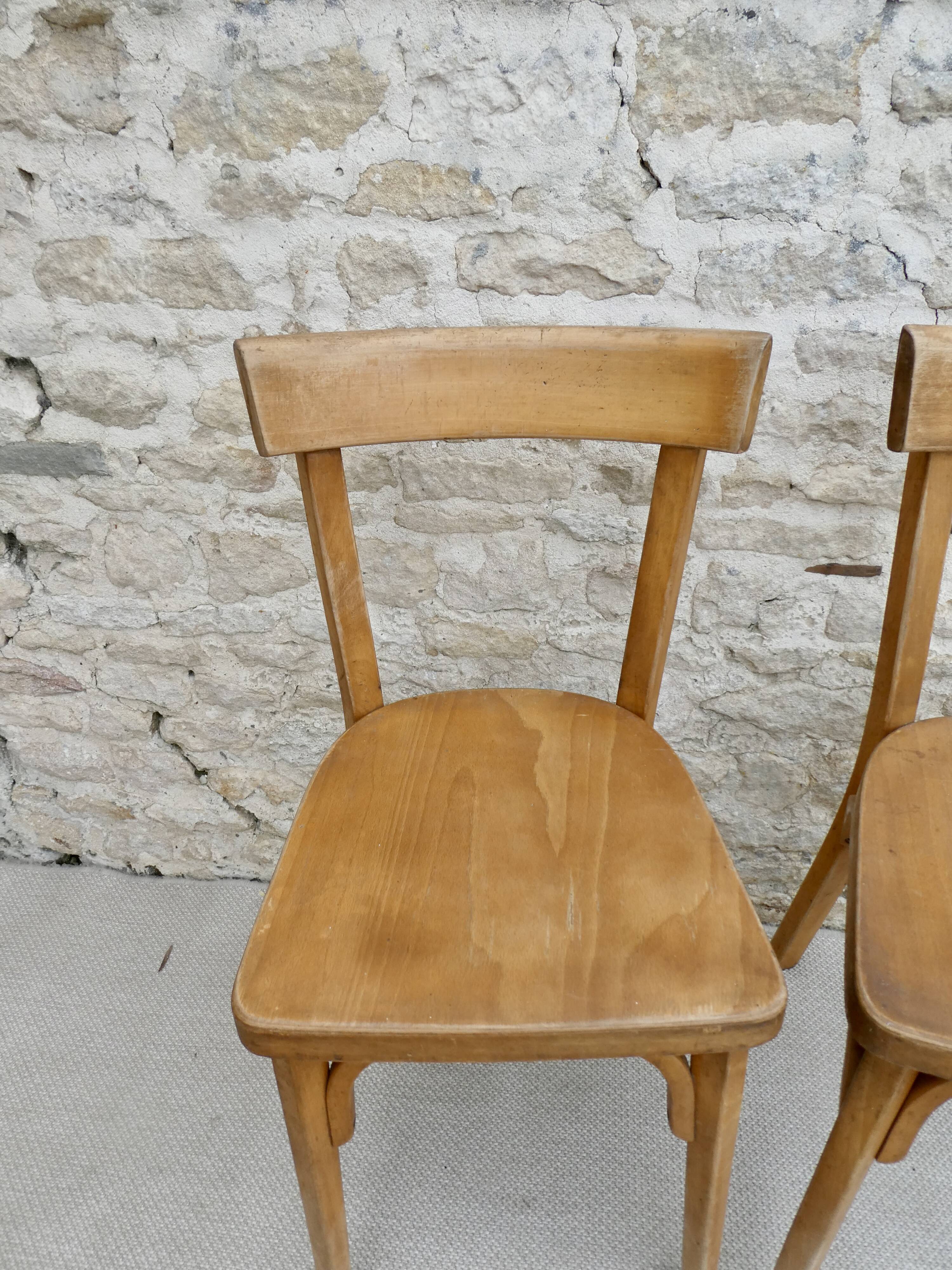 Pair of Baumann bistro chairs in light wood
