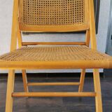 Vintage wooden folding chair with 1970 rattan seat and back