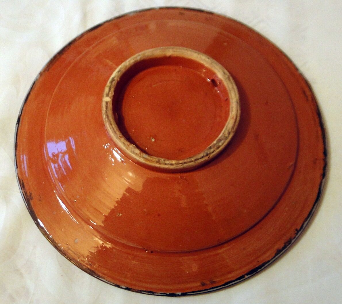 Hollow glazed terracotta dish with oriental decor to hang