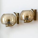 Brass and smoked glass arc wall lights. 1970