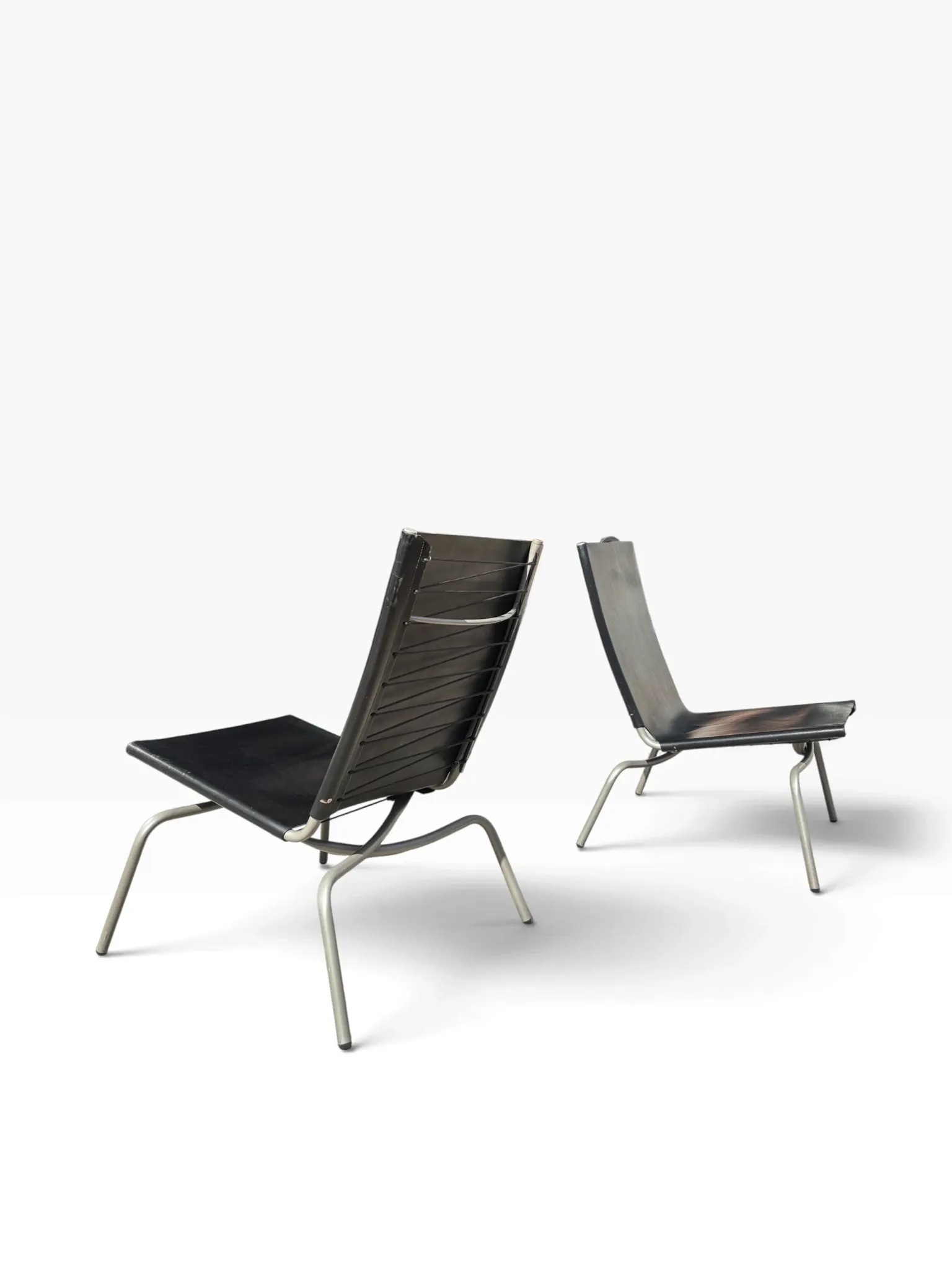 Set of 2 Crossed Legged lounge chairs by Fabiaan van Severen.