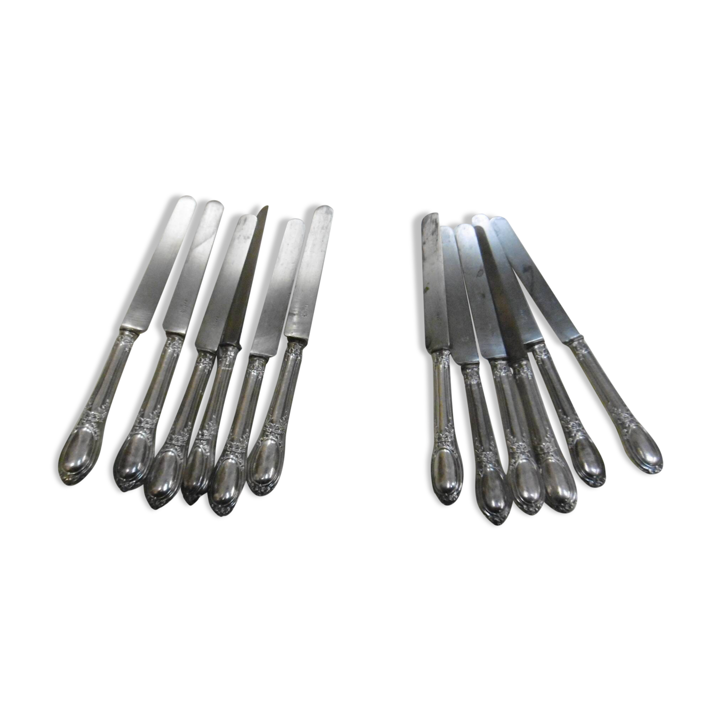 Couteaux en argent fourré poinçon minerve fin XlXeme decor rubans et fleurs