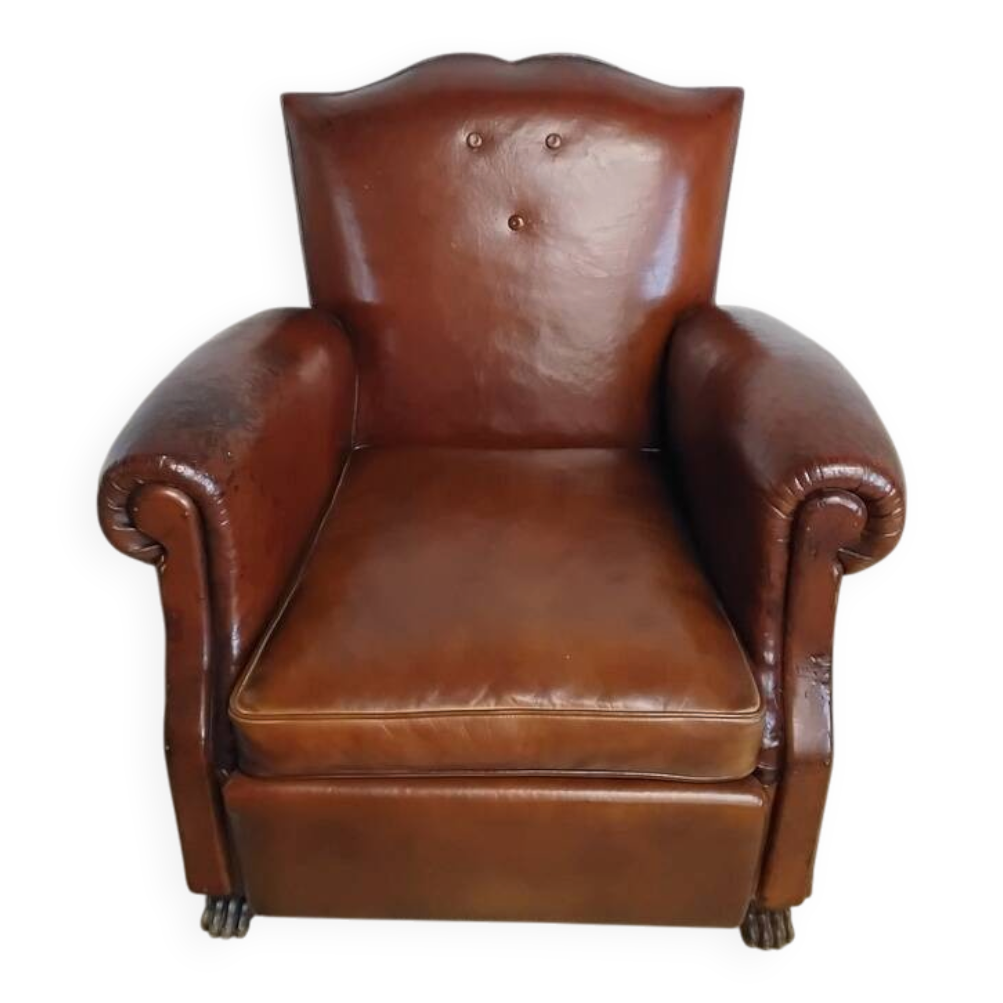 Club chair with moustache back and lion feet.