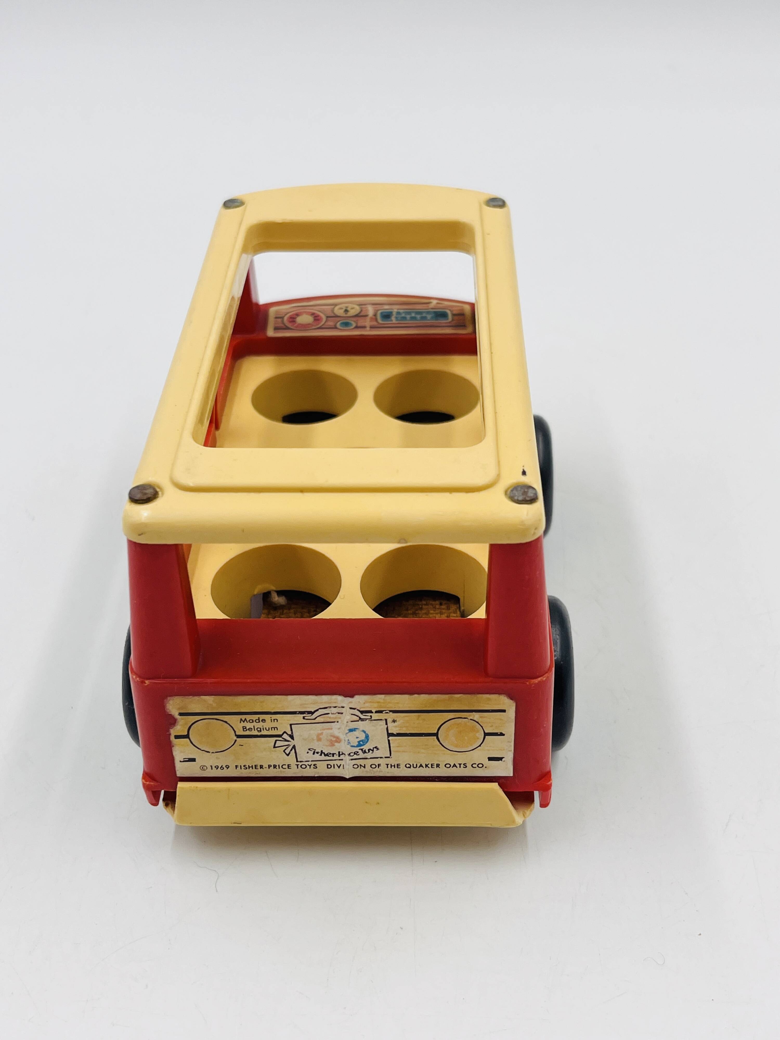 Set of 4 Fisher-Price wooden toys from the 1960s