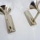 Pair of chrome metal wall sconces and blown glass