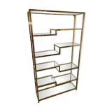 Old shelf in golden metal brass geometric library design 80s vintage