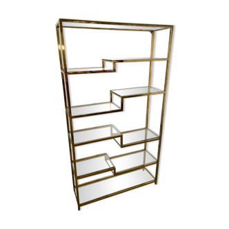 Old shelf in golden metal brass geometric library design 80s vintage