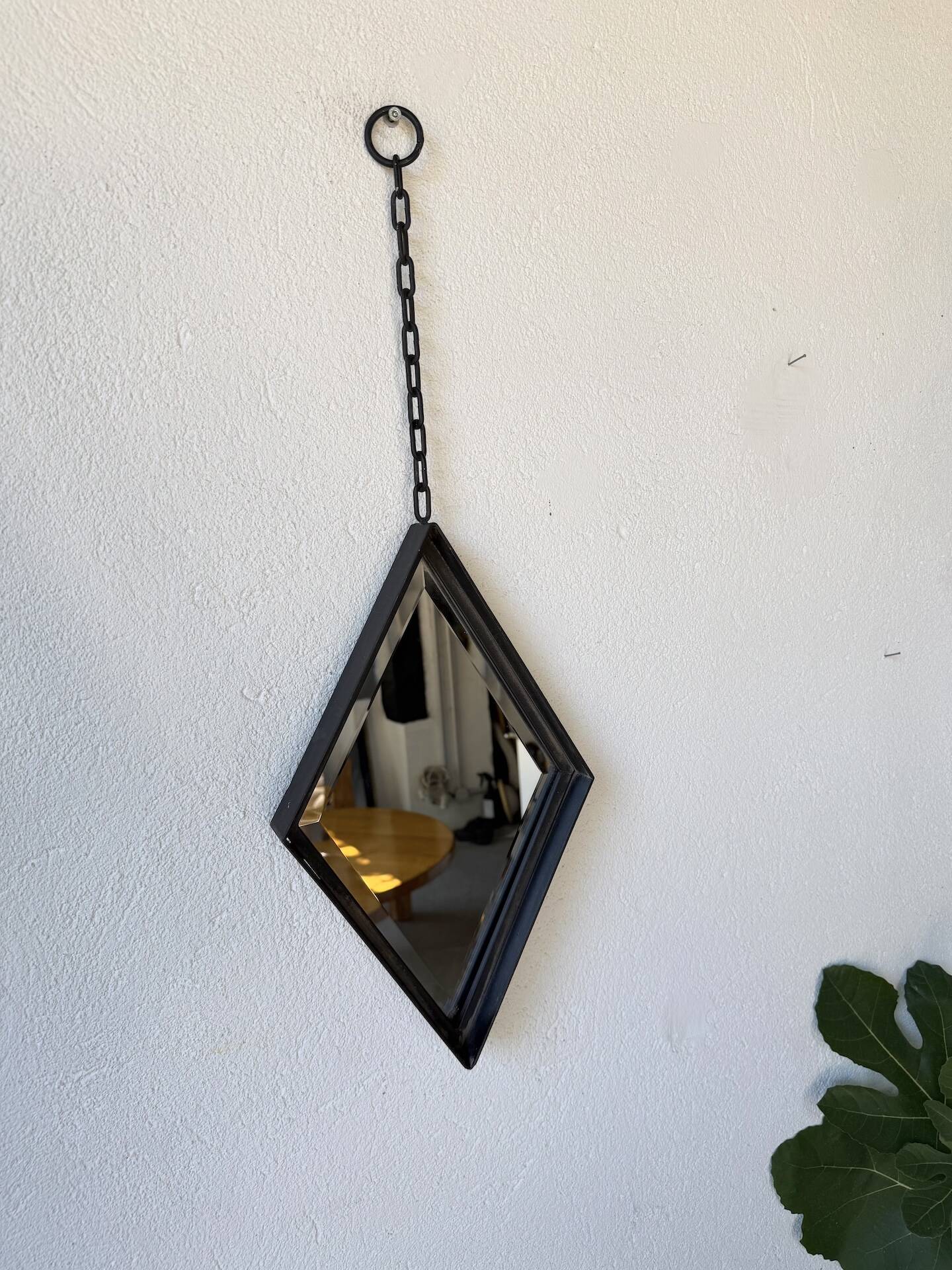 Miroir brutaliste losange en fer