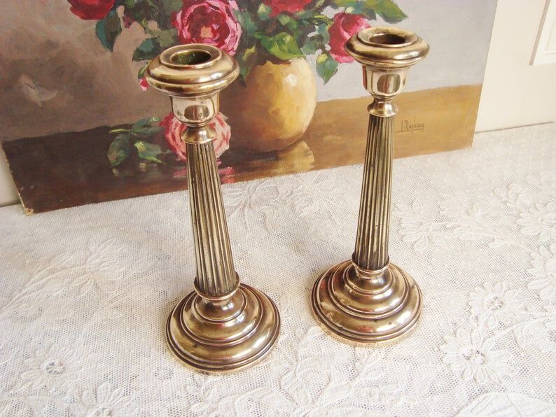 Pair of very old brass candlesticks