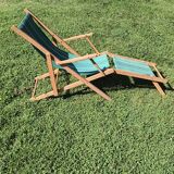 Vintage wooden and striped canvas deck chair – Retro style, chic country style