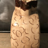 Ceramic pitcher with floral decoration signed Lucq