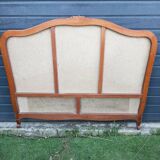 antique fabric and wood headboard