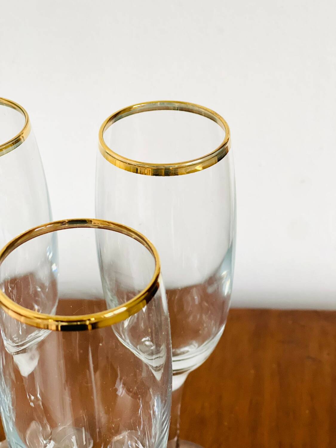 Gold rimmed champagne flutes