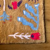 Tapis tufté à la main