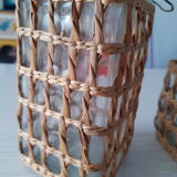 Pair of glass jars and rush